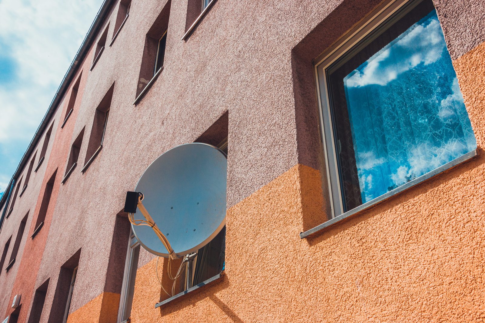 Multi-storey apartment building suited to a properly designed communal DSTV distribution system