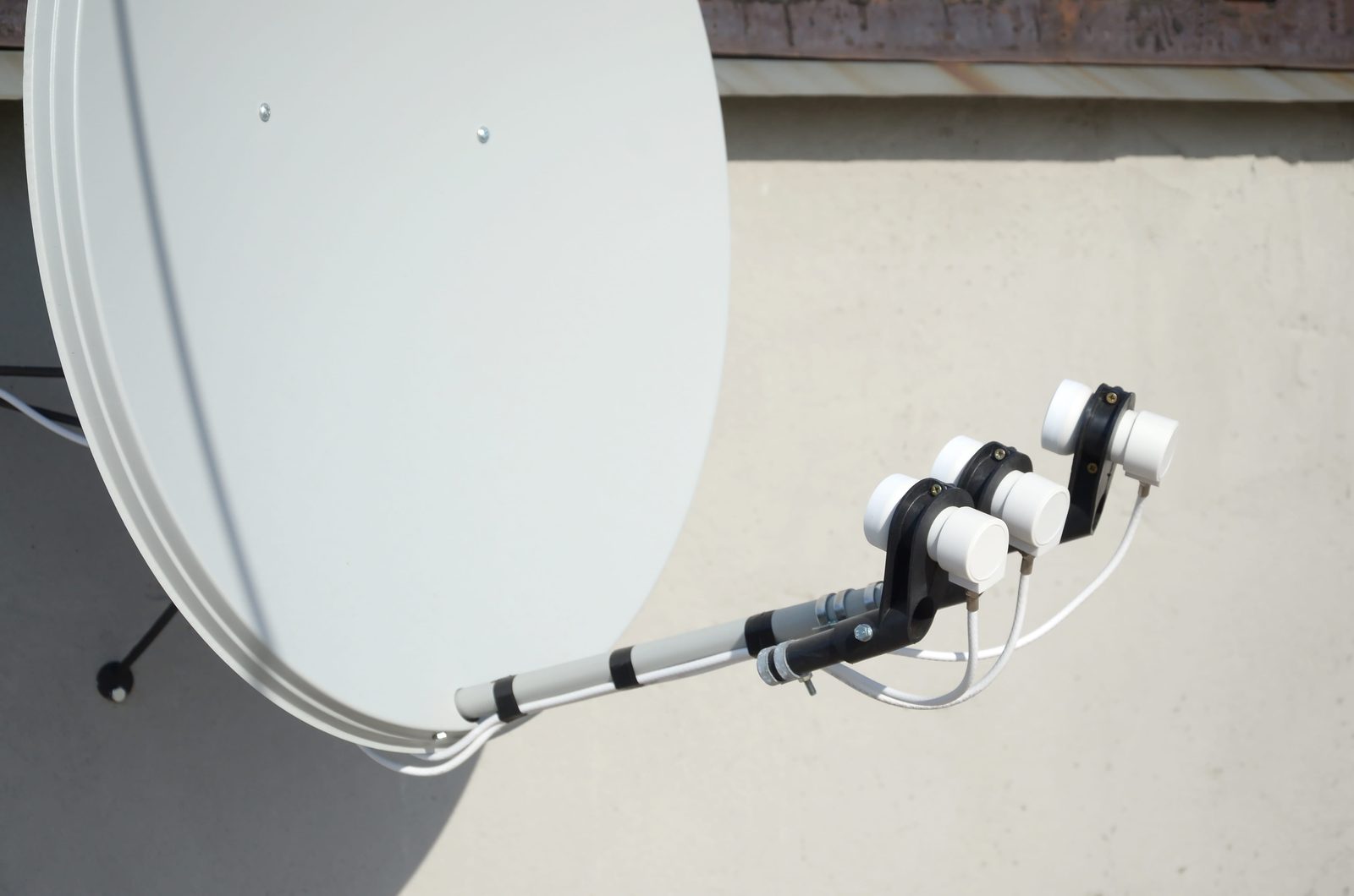 Smart SCD2 LNB with multiple outputs mounted on a residential DSTV dish in Gauteng